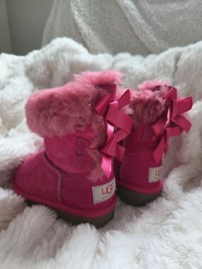 UGG Pink Shearling Bow Boots